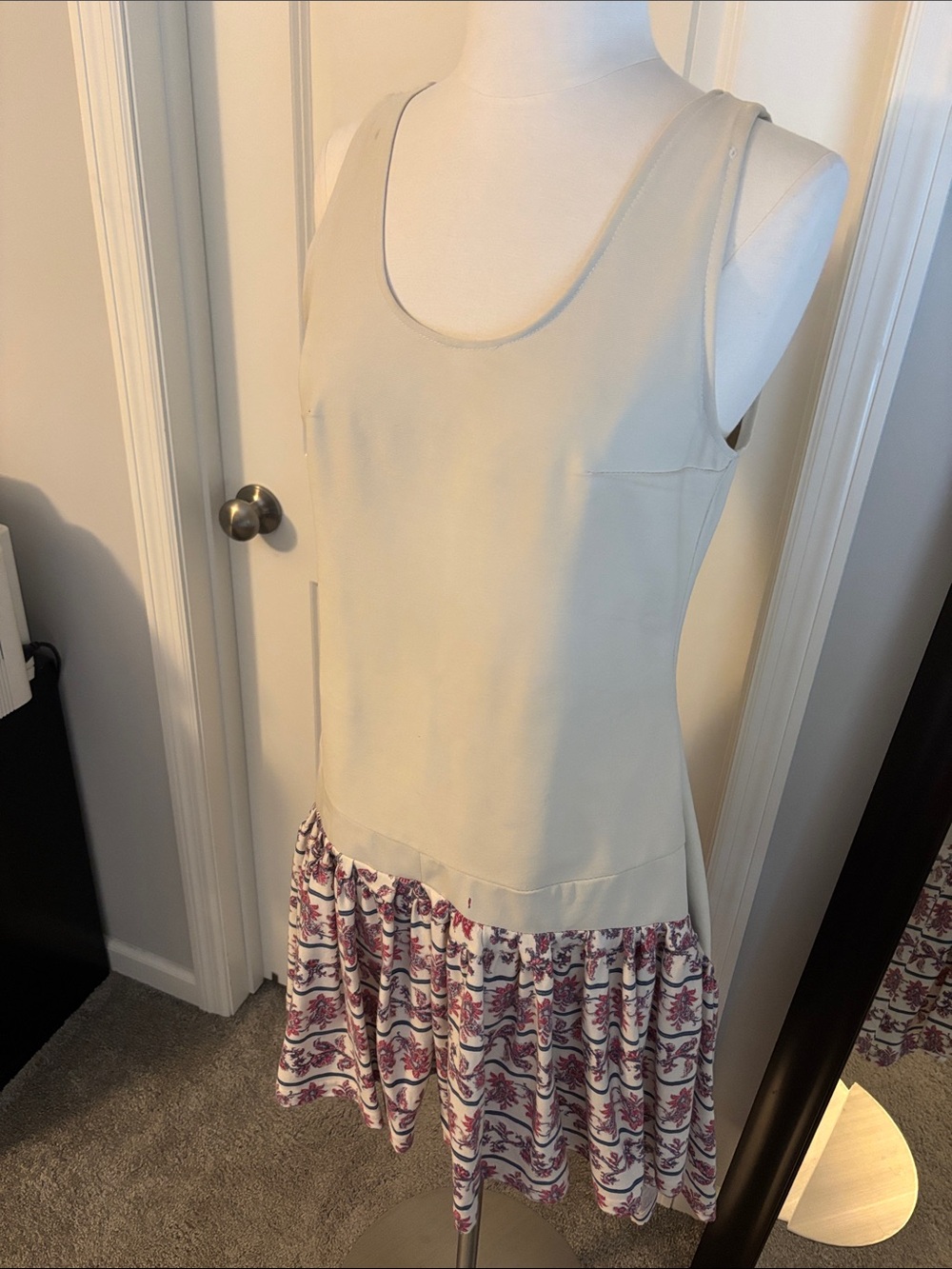 Sleeveless Cream Drop-Waist Dress with Printed Skirt